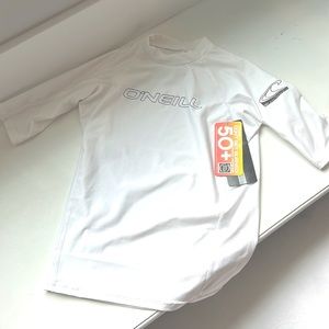 BRAND NEW boys white rash guard size 16 runs a little small.